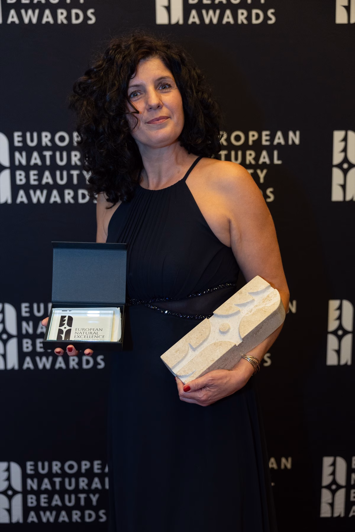 Lantestina founder Ivana Ključarić holding the New Brand of the Year trophy and the European Natural Excellence certificate, ENBA 2026 Paris